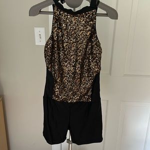 Theatrical black and gold sequence romper